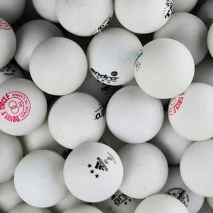 What Are Ping Pong Balls Made Of? Journey From Cork to plastic 2 Set of white balls on a surface